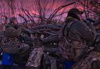 two hunters use their duck whistles as the sun begins to rise