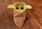 Baby Yoda mocktail wrapped in a cute burlap robe