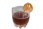 Old fashioned mocktail with a candied orange slice