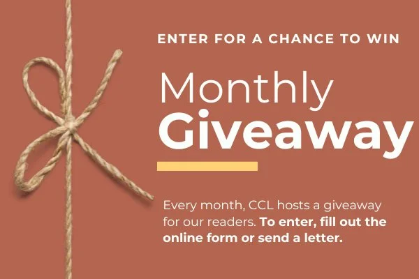 Image with a brown background features the text "Monthly Giveaway" and instructions to enter by filling out an online form or sending a letter. A piece of twine is tied in a bow on the left.