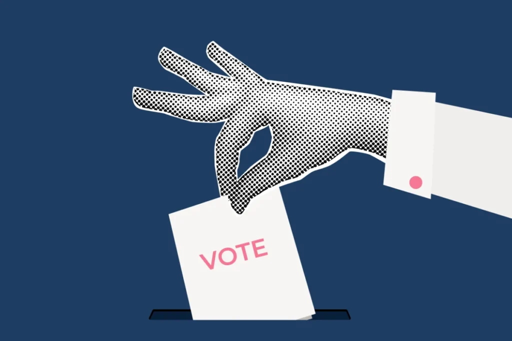 Illustration of a hand placing a ballot labeled "VOTE" into a ballot box against a dark blue background.