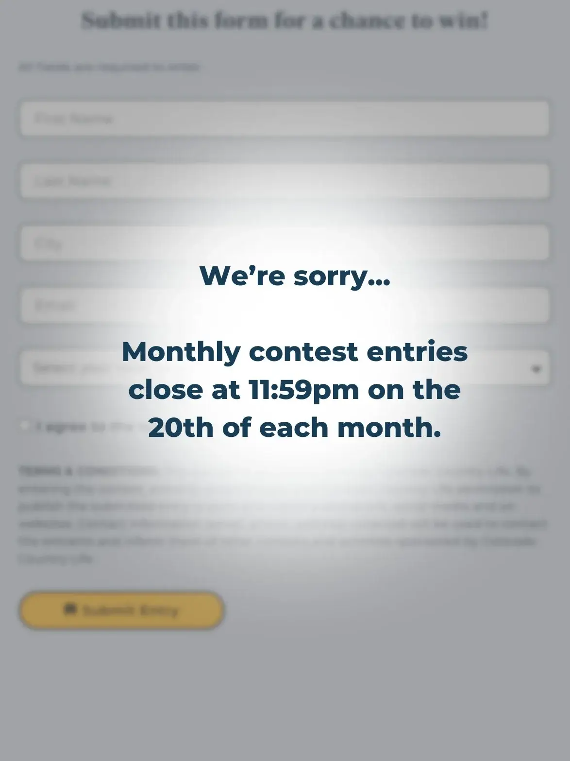 Blurred image of a form with a clear text overlay: "We're sorry... Monthly contest entries close at 11:59pm on the 20th of each month.